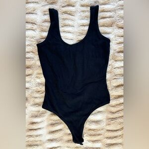 Shrinking Violet - Black Scoop-Back One-Piece Bodysuit